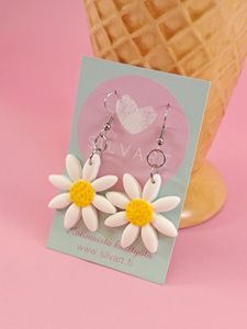 Päivänkakkara-korvakorut 