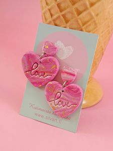 Love-nappikorvakorut